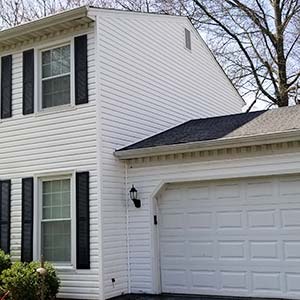 Photo of house with soft washed siding and mildew removal