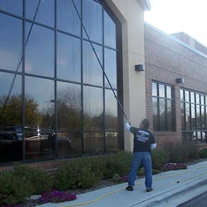 Photo of Powerhouse Pete performing commercial window cleaning