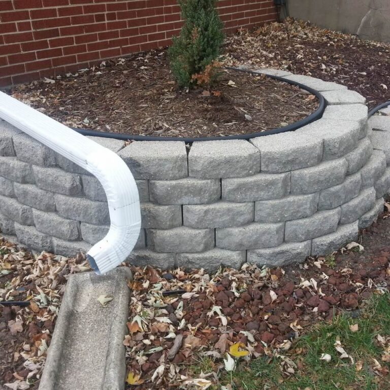 Photo of grey pavers in a semi-circle fully cleaned and restored
