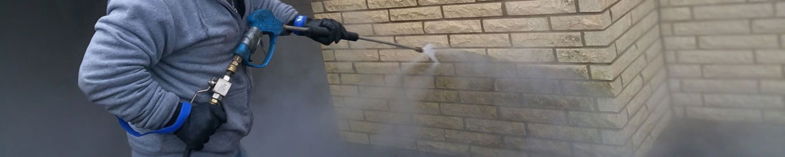 Photo of Powerhouse Pete power washing and restoring bricks