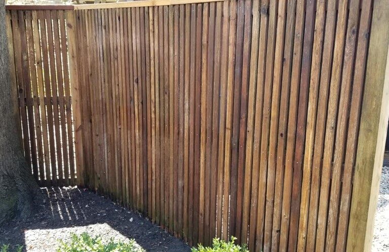 Photo of a restored wood fence
