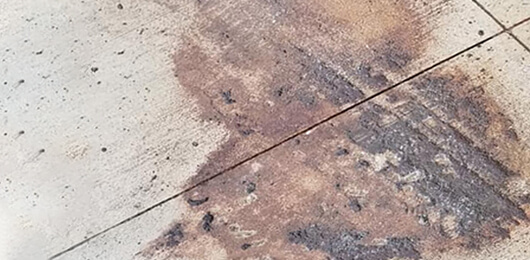 Before photo of rust on concrete