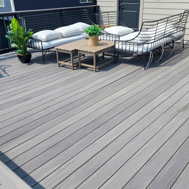 Photo of a gray deck after being cleaned